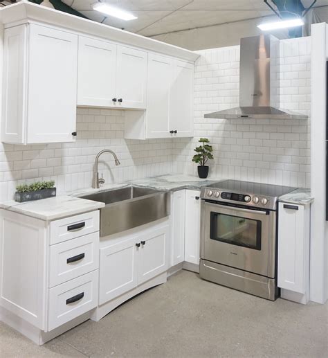 white cabinets with stainless steel farm sink|white cabinet farmhouse kitchen backsplash.